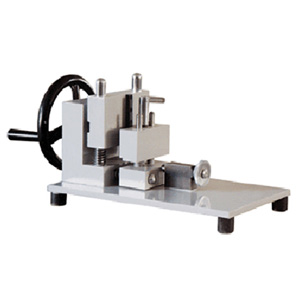 Impact sample making machine