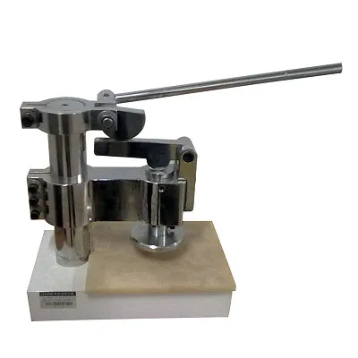 Manual test specimen punching device